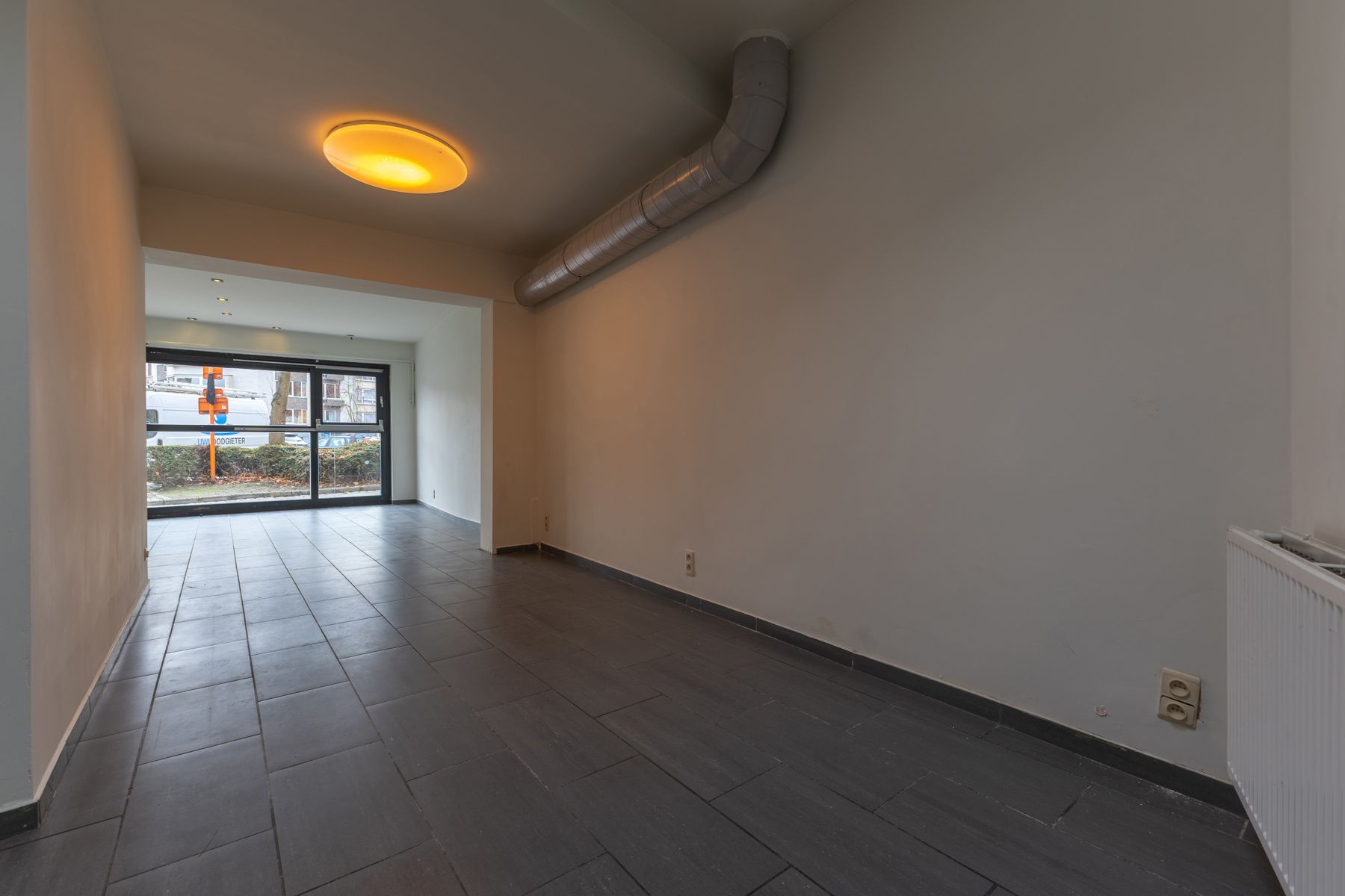 Commercieel gelijkvloers met duplex in centrum Halle foto 11