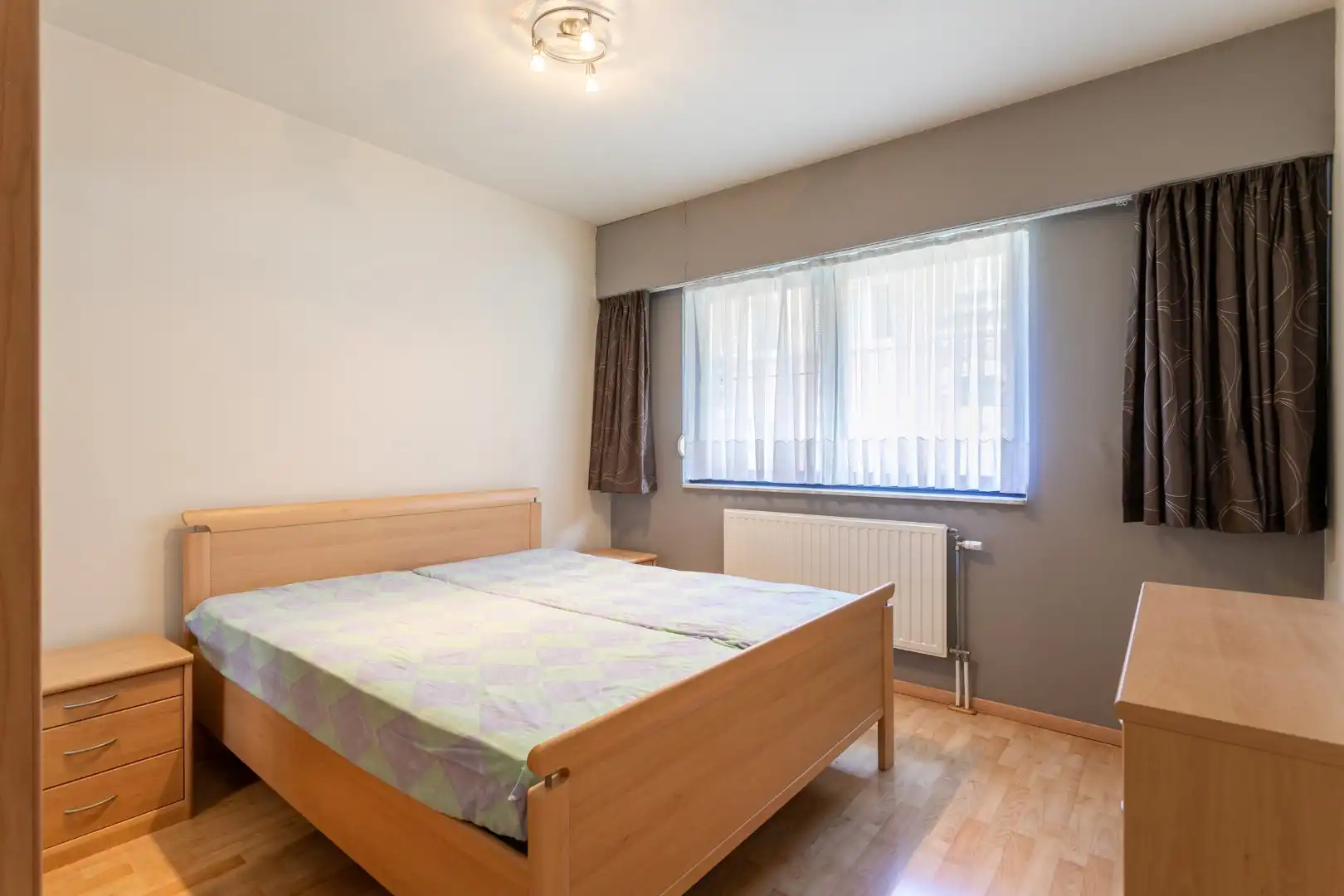 App met 2 slpk, tuin, kelder en staanplaats foto 11
