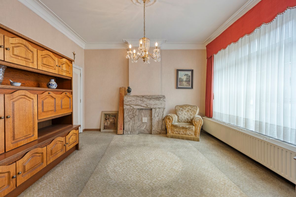 Te renoveren rijwoning in hartje Bilzen foto 5