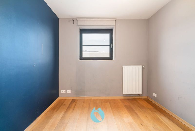 Deze woning is rustig gelegen in woonerf Brielken te Evergem foto 9