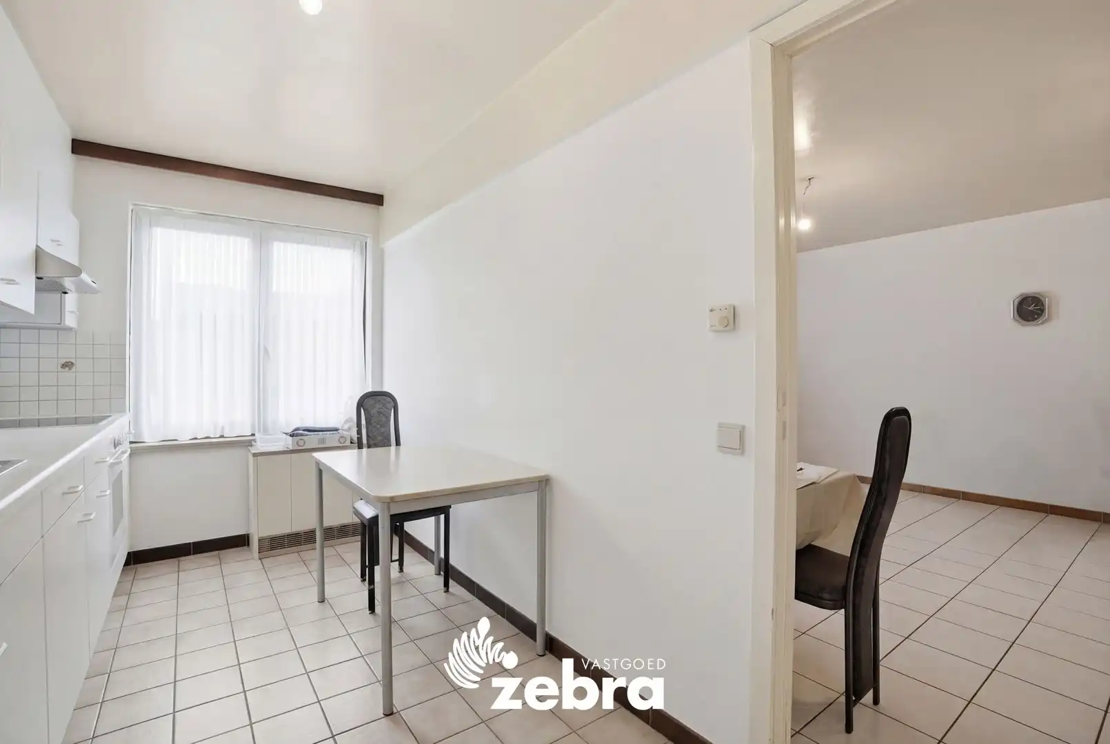 Gelijkvloers 2-slaapkamerappartement met terras en garage in centrum Tielt! foto 8