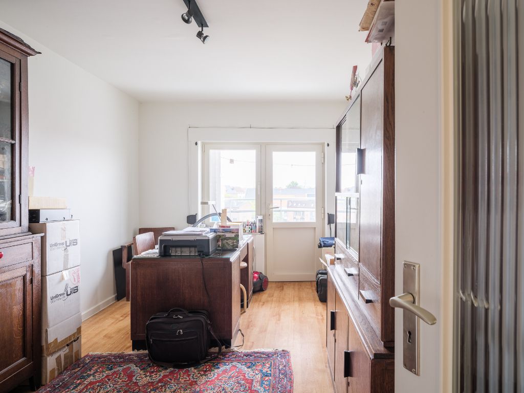 Instapklaar 2-slaapkamer appartement met een zicht over de Coupure foto 12
