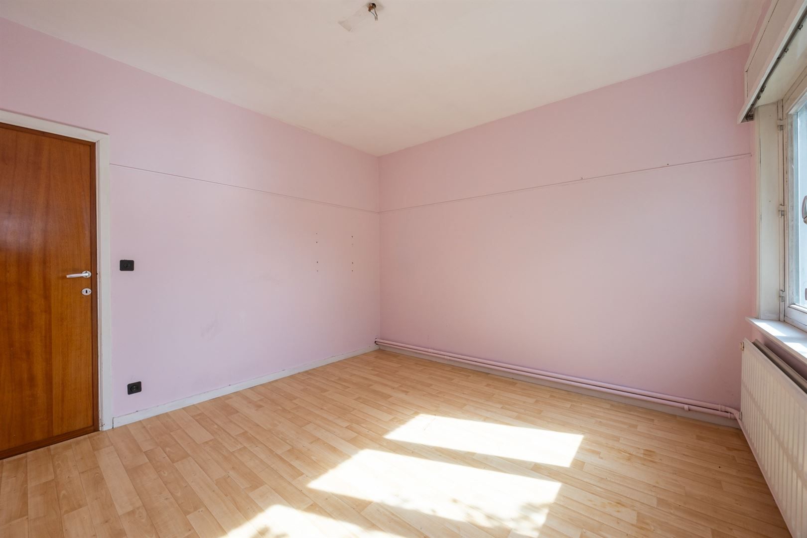 Halfopen woning in kindvriendelijke straat foto 13