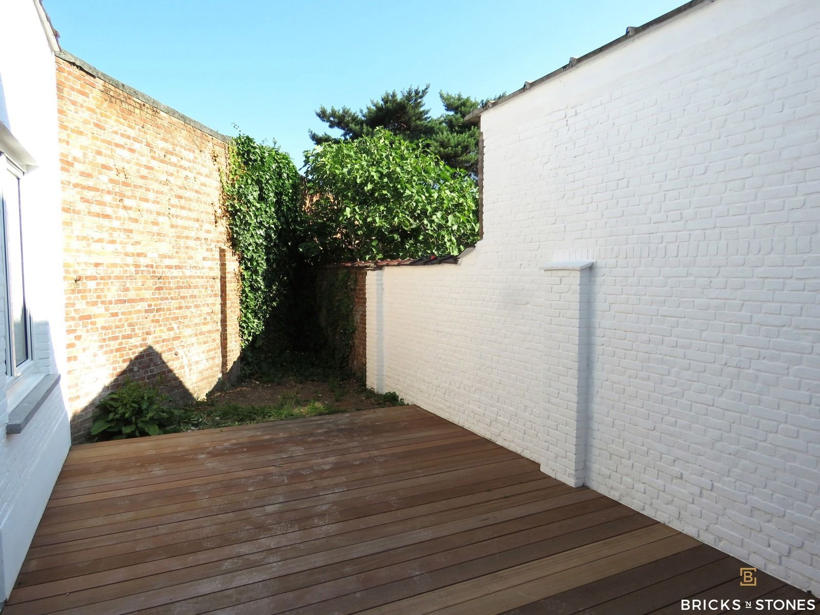Gerenoveerd appartement met 2 slaapkamers, tuin en garage !  foto 6