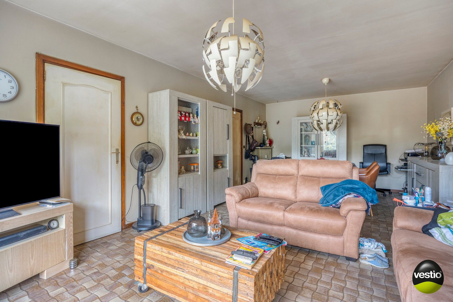 Te renoveren 2-slaapkamerappartement met terras, garagebox en kelder. foto 2