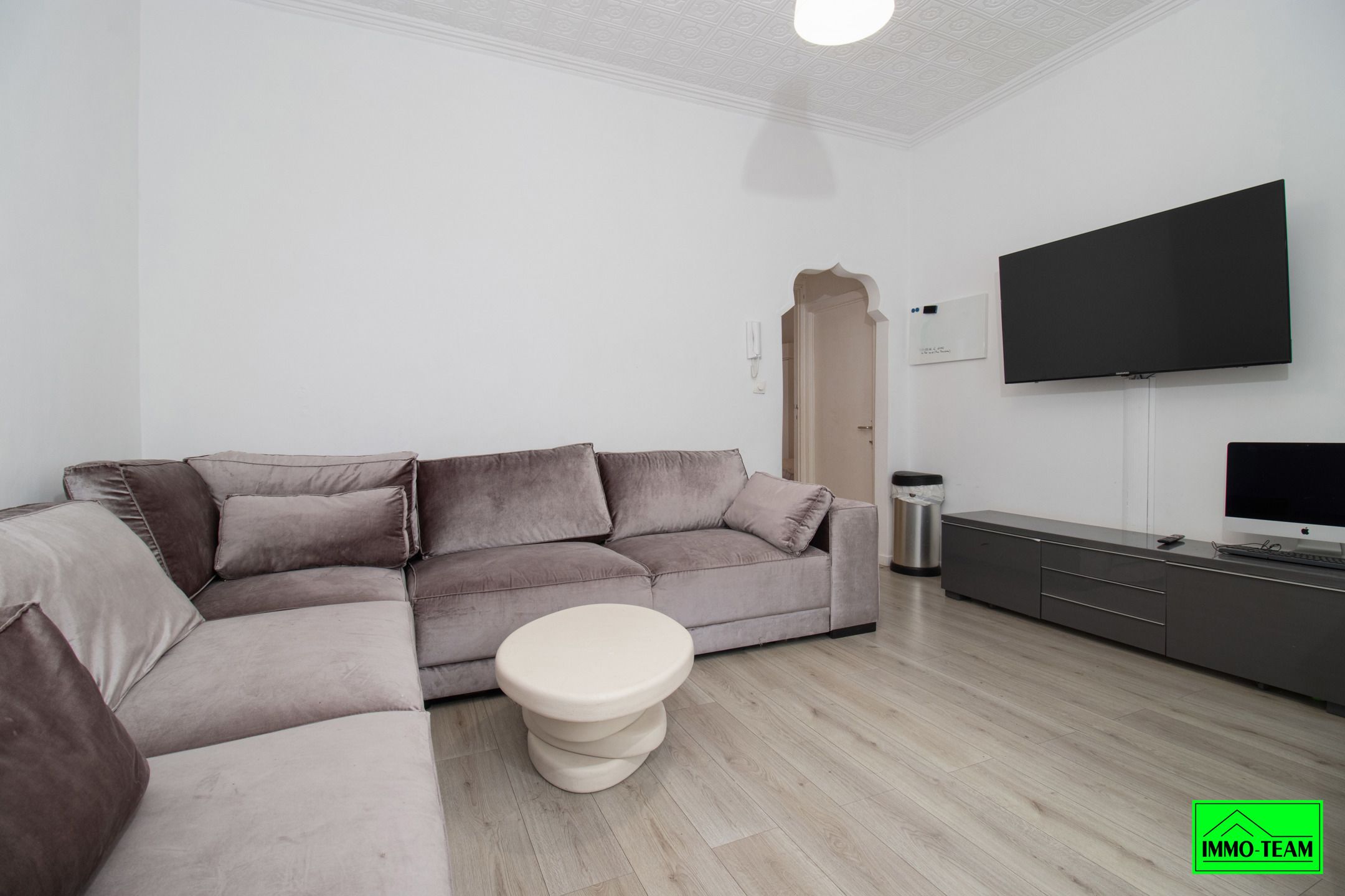 Opbrengsteigendom met handelszaak en 2 duplexappartementen foto 7