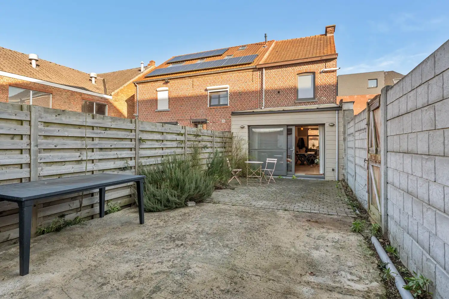 Goed gelegen halfopen bebouwing met 3 slaapkamers en een tuin met een poortje naar de straat te Wilsele! foto 10