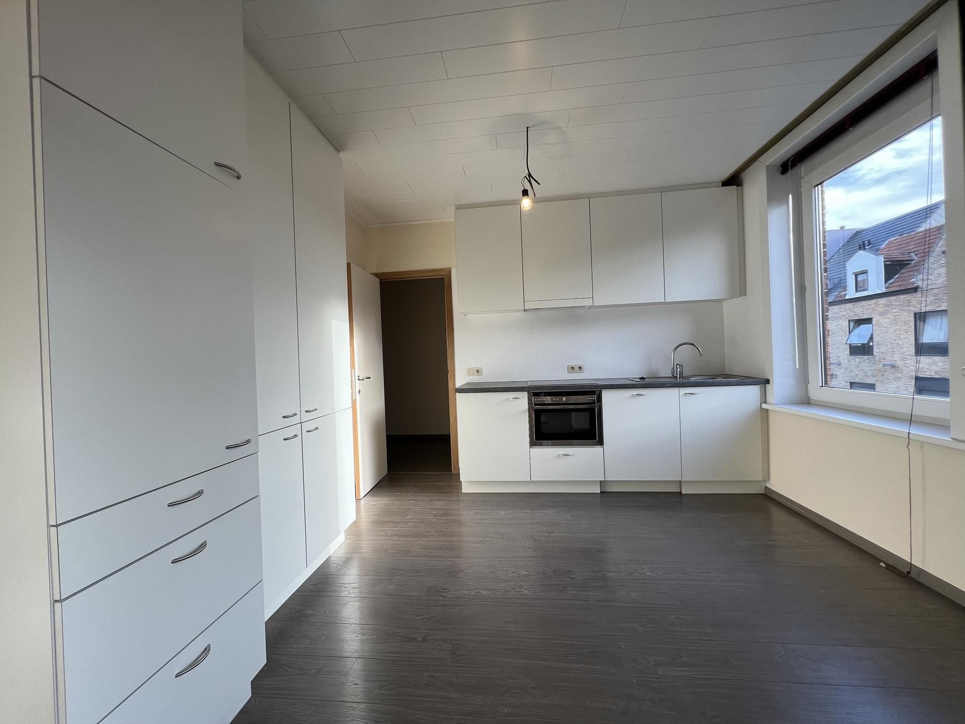 Charmant duplexappartement met 3 slaapkamers en terras te Ieper foto 5