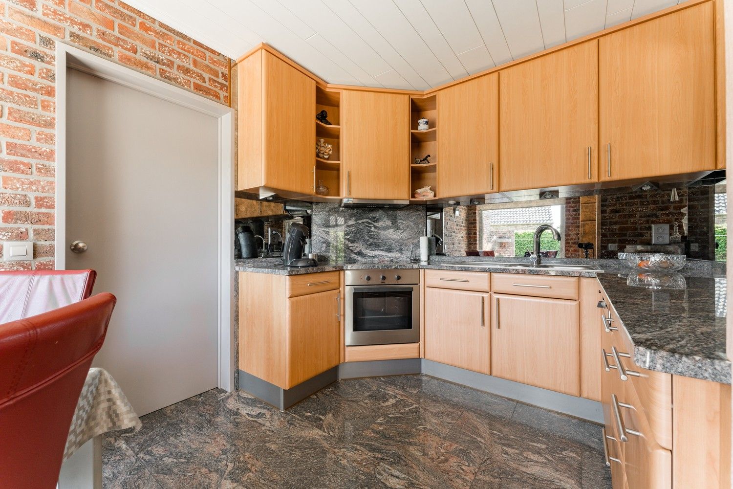 Gelijkvloerse 3 SLK woning op een mooi onderhoudsvriendelijk perceel foto 22
