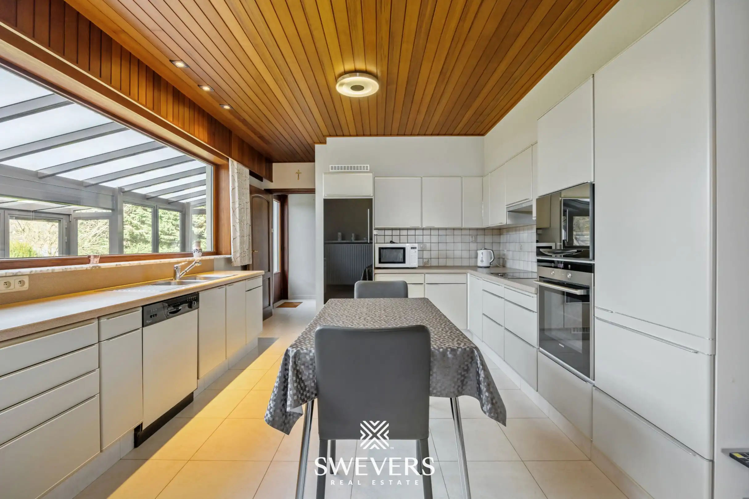 Leuke gezinswoning (4 slpk) met veel potentieel op zonovergoten perceel van 15a 84ca in doodlopende straat te Boekt foto 7