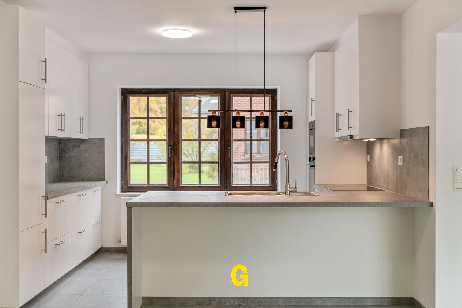 Vakkundig gerenoveerde woning met binnenkoer, tuin en bijgebouwen op 4a 62ca - EPC label B foto 3