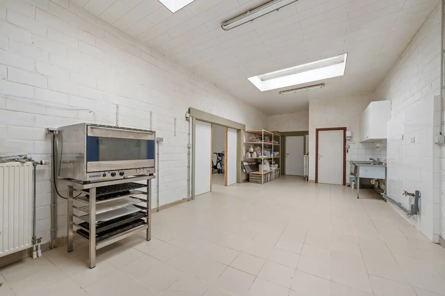 Veelzijdig (handels)huis met atelier, magazijn en zalige tuin op 1.400 m² te Meldert foto 21