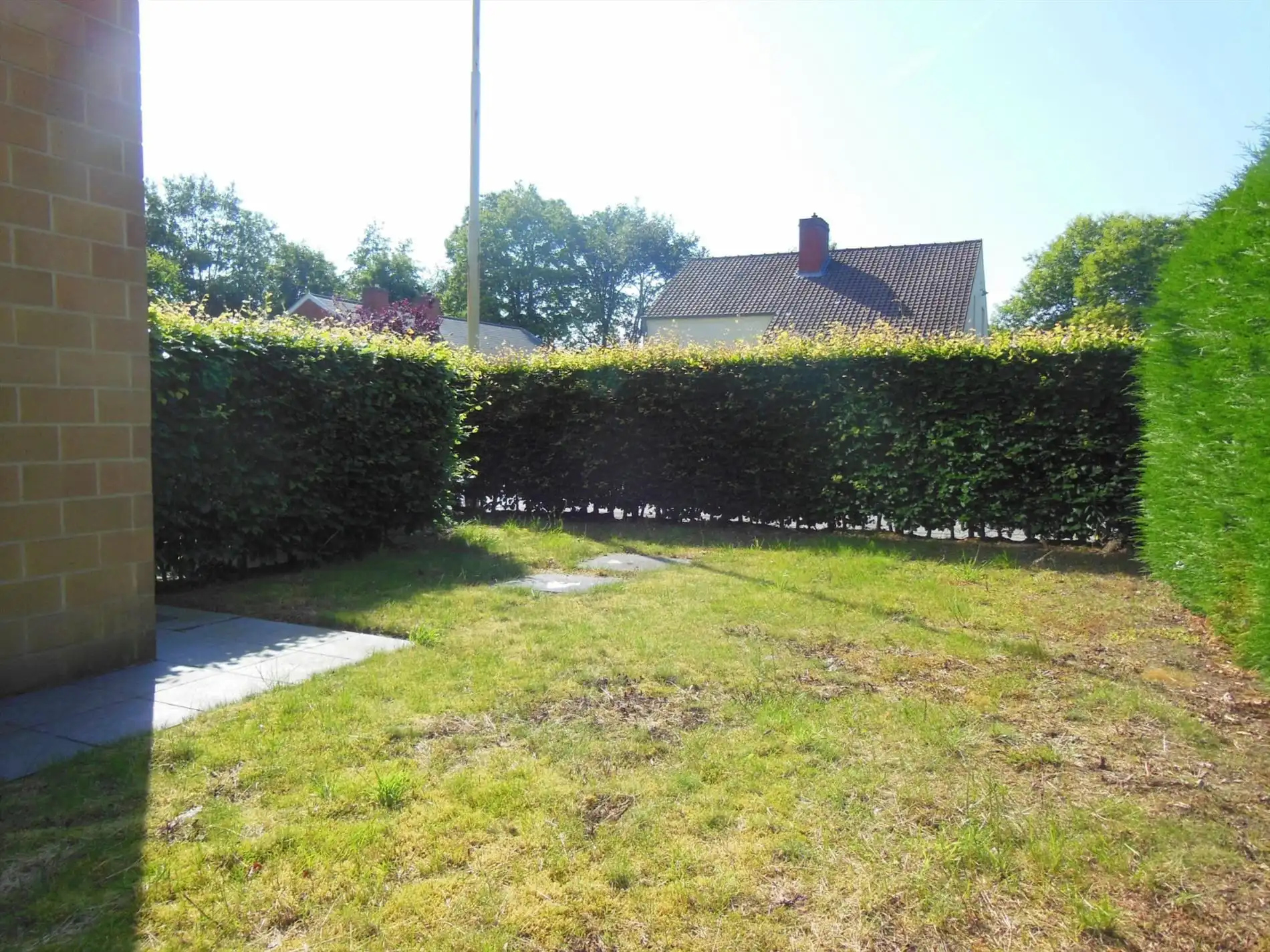 Gezellig gelijkvloersappartement met zonnige tuin en garage foto 10