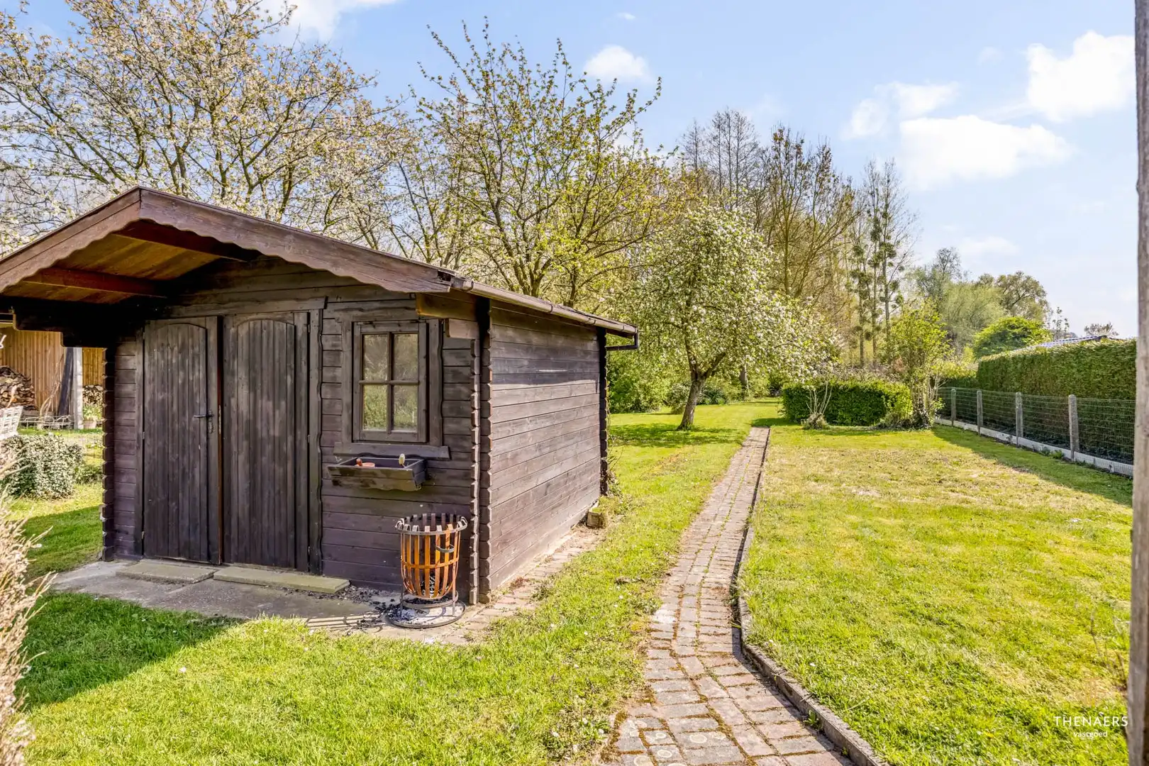 Ruime halfopen woning met 3 slaapkamers en prachtige tuin. foto 22