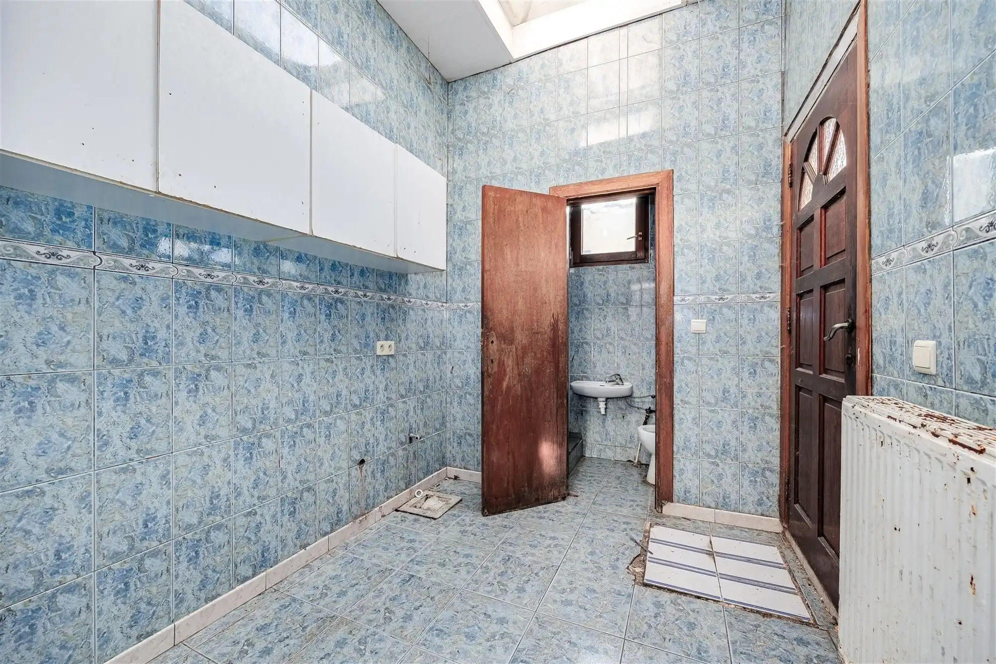Te renoveren woning met 4 slaapkamers en koer foto 7