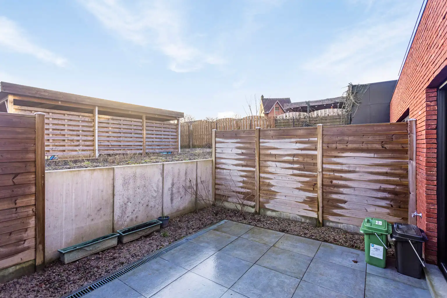 Gelijkvloersapp. in uitstekende staat met 1 slpk en carport foto 11