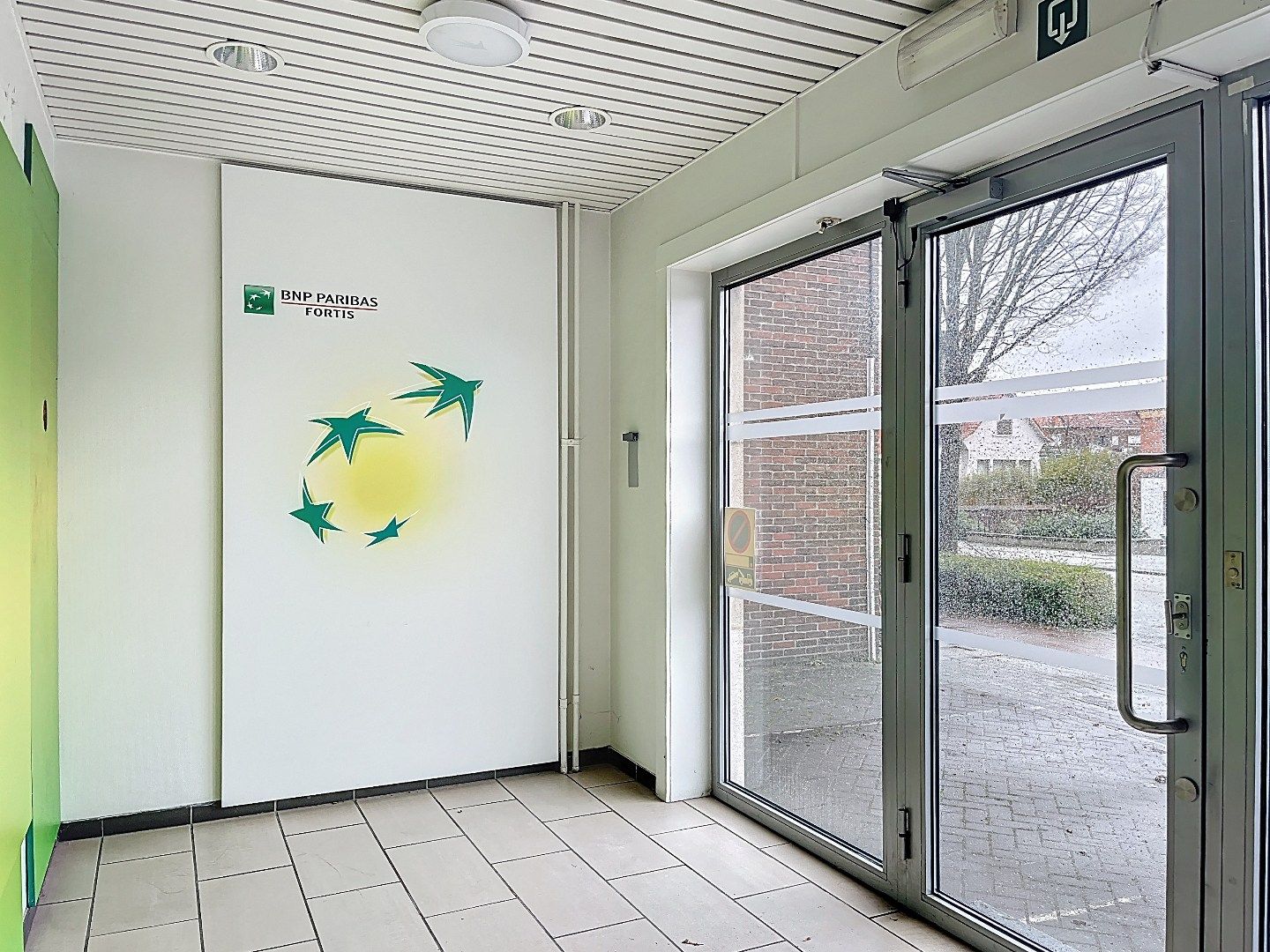 Veelzijdig pand op topligging: wonen en werken of tweewoonst met terrassen en garage foto 2