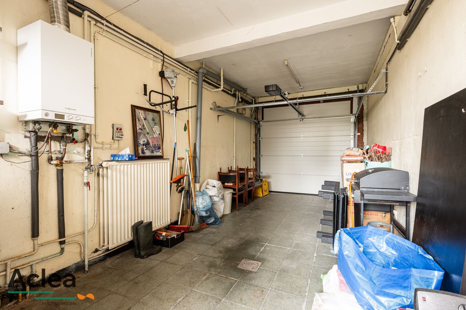 Te renoveren woning met 4/5 slpks en mooie zuid gerichte tuin foto 14