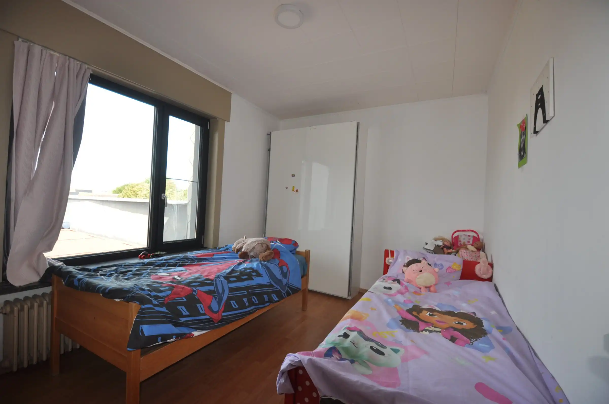 Bel-etage met 2 slaapkamers en aangenaam dakterras foto 8