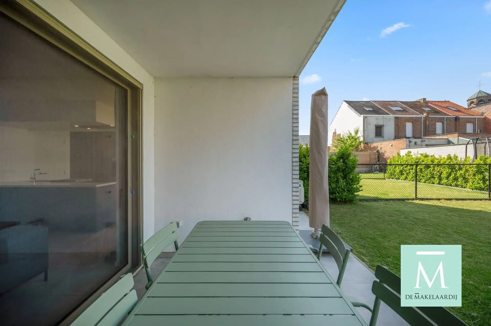 Instapklaar gelijkvloers appartement (2023) met zonnige tuin en laadpaal! foto 10