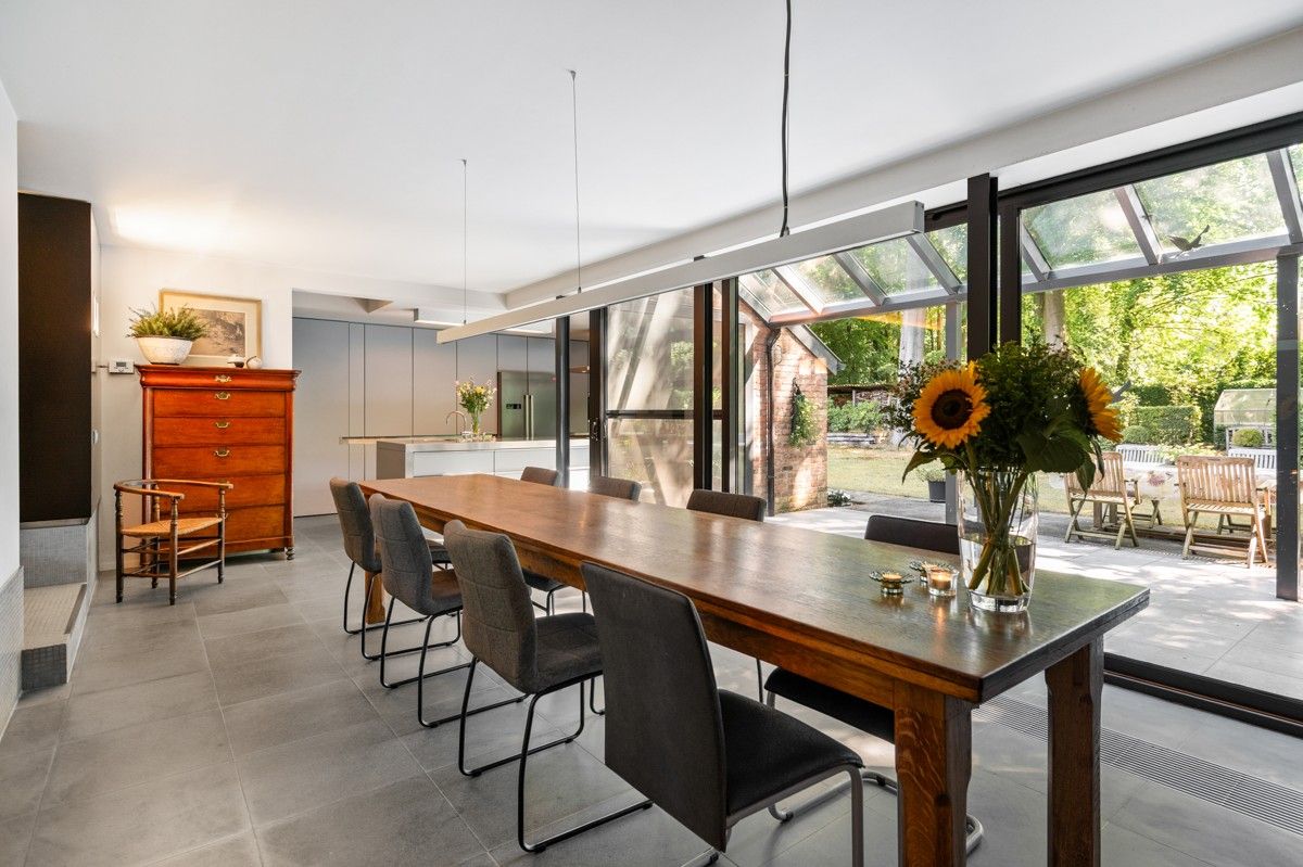 Verrassend ruime woning op 1289 m² gelegen aan een bosrand met mogelijkheid tot 4 slaapkamers foto 7