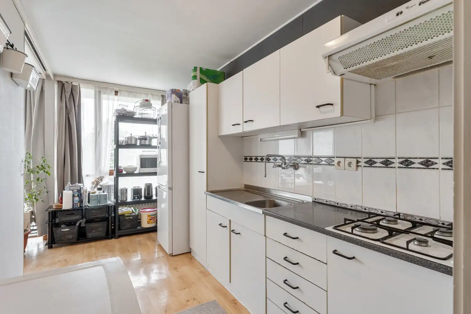 Gunstig gelegen appartement met 2 slaapkamers, ondergrondse autostaanplaats en kelderberging. foto 9
