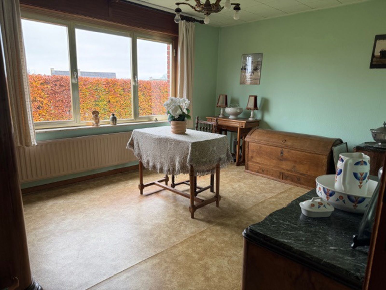 Charmante splitlevelwoning 2 slpks en grote garage te Tienen foto 9