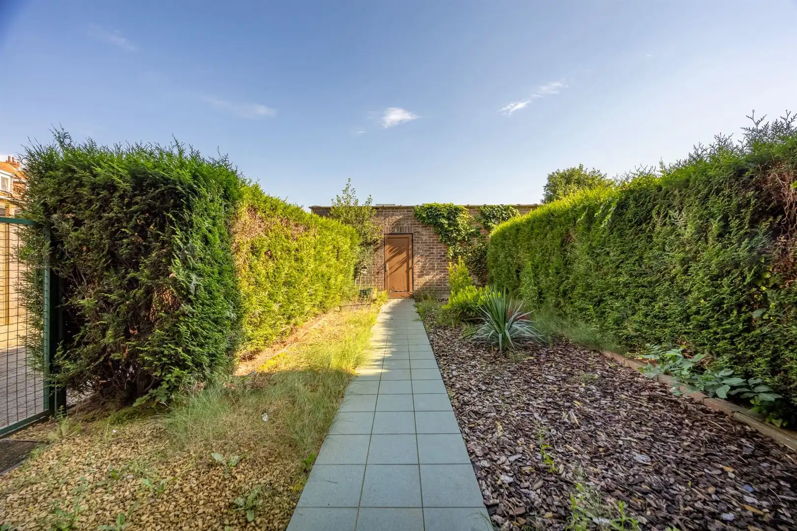 Gelijkvloers appartement met tuin en garagebox  foto 3