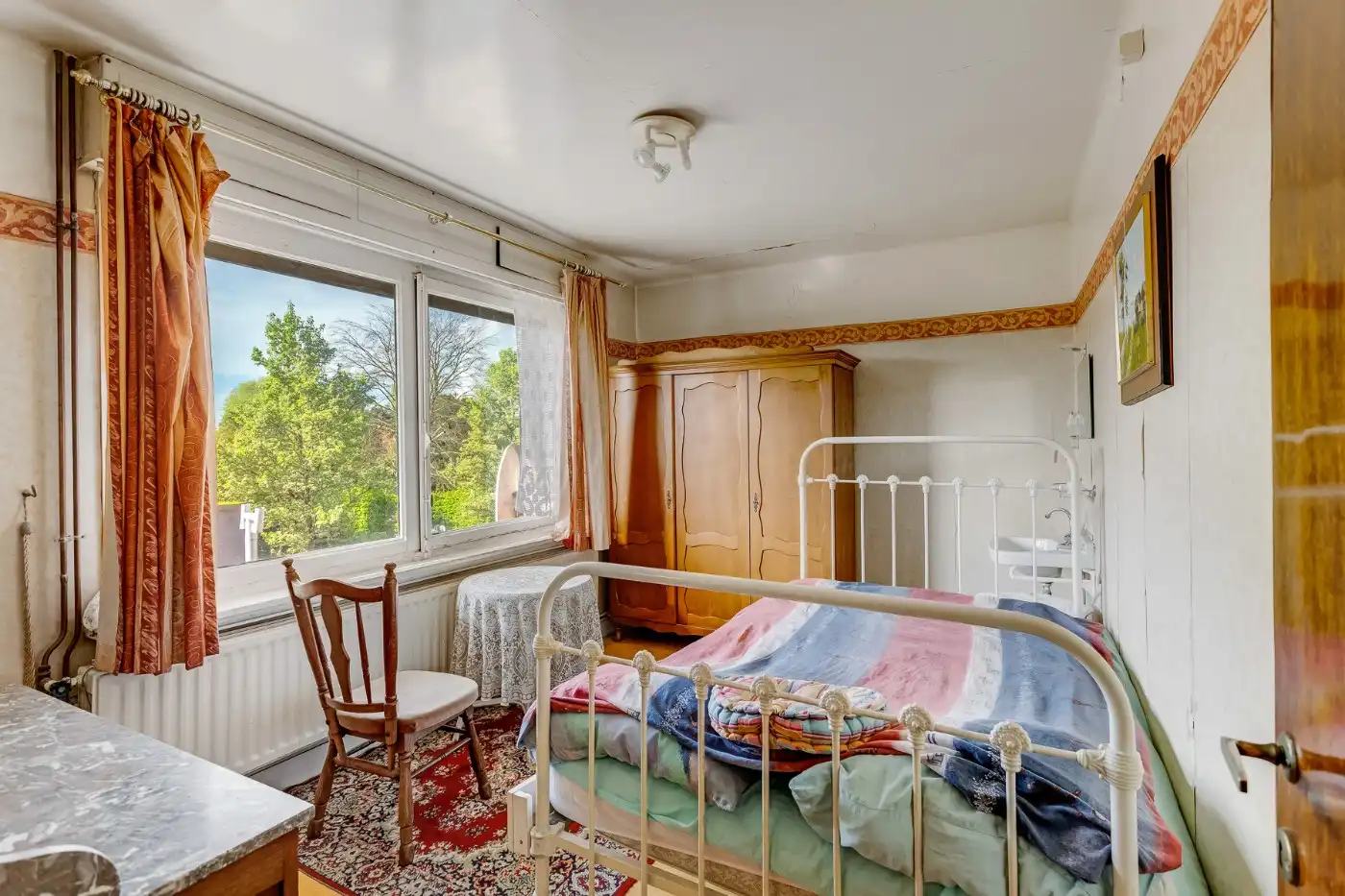 Te renoveren, geklasseerde art deco woning met 3 slpk, ruime zolder en Z-tuin foto 18