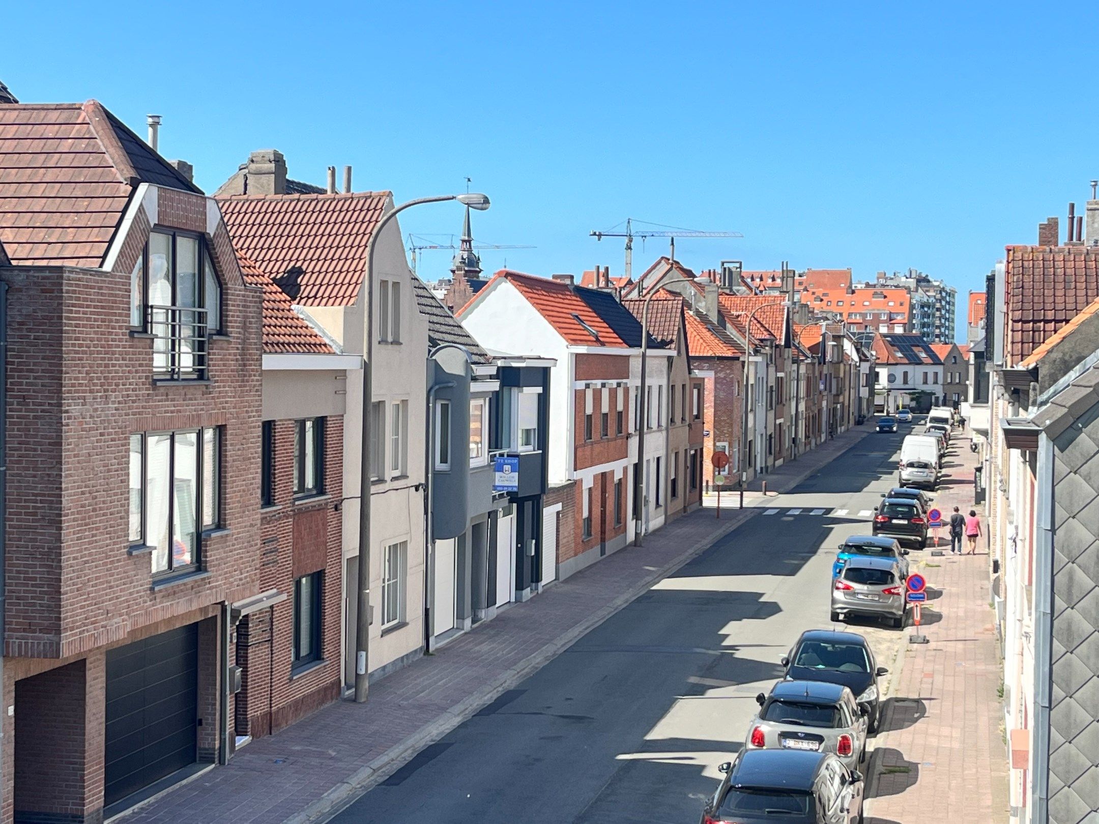 Opbrengsteigendom met 2 wooneenheden en garage te Heist foto {{pictureIndex}}