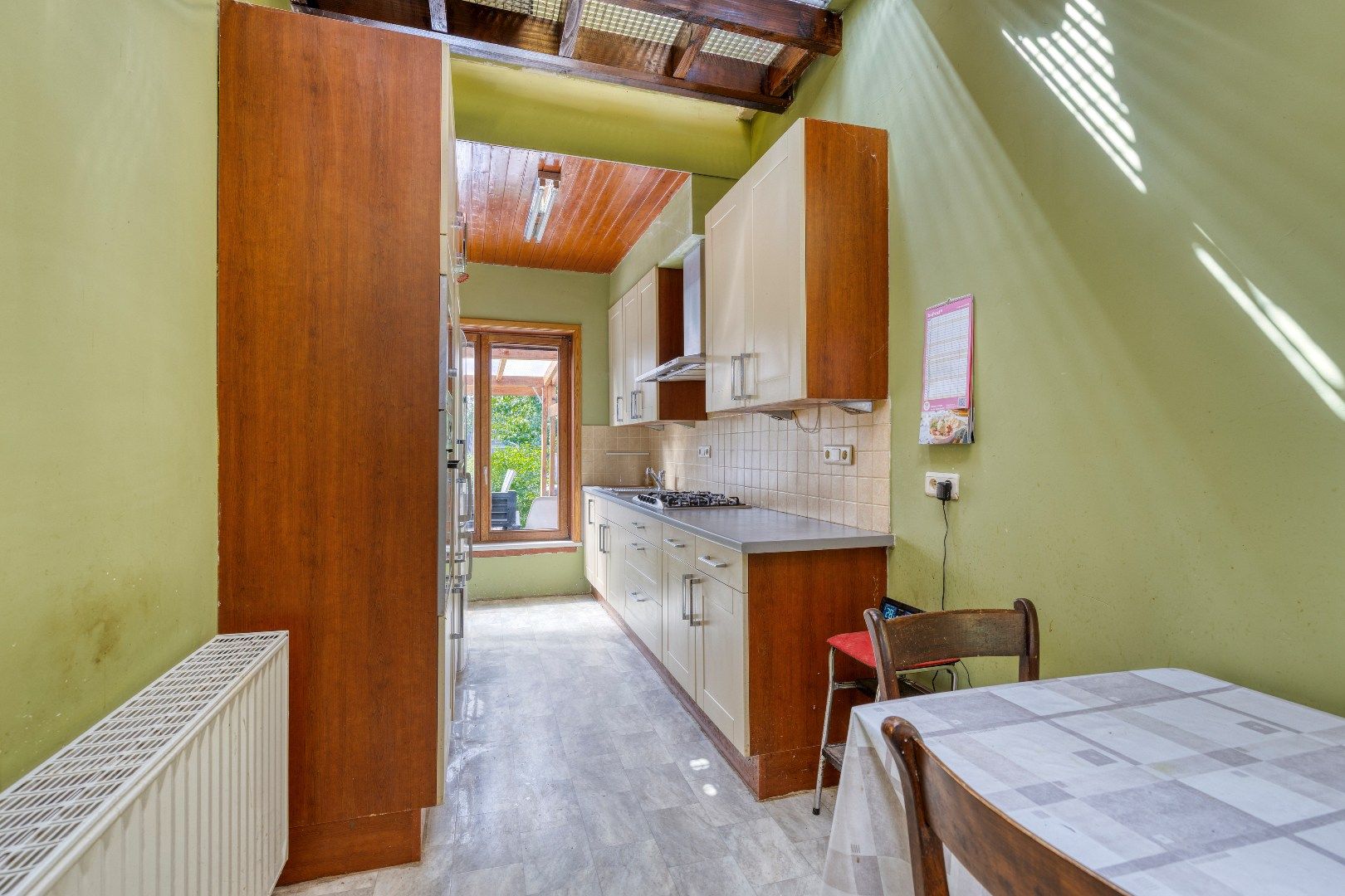 Energiezuinige woning met 3 slaapkamers, bureau, tuin en 2 garageboxen foto 4