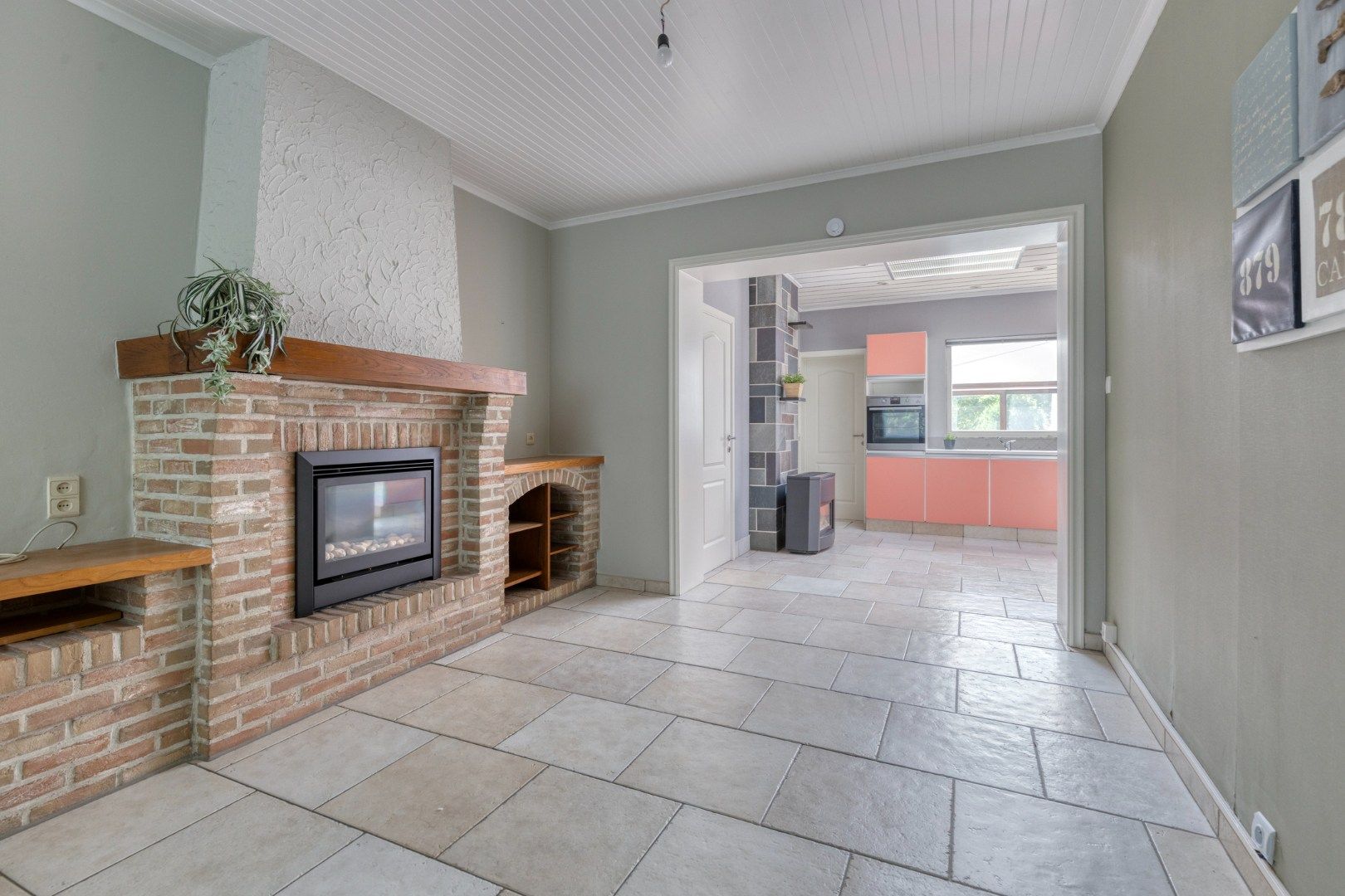 Verzorgde woning met 3 kamers, diepe tuin én garage! foto 3