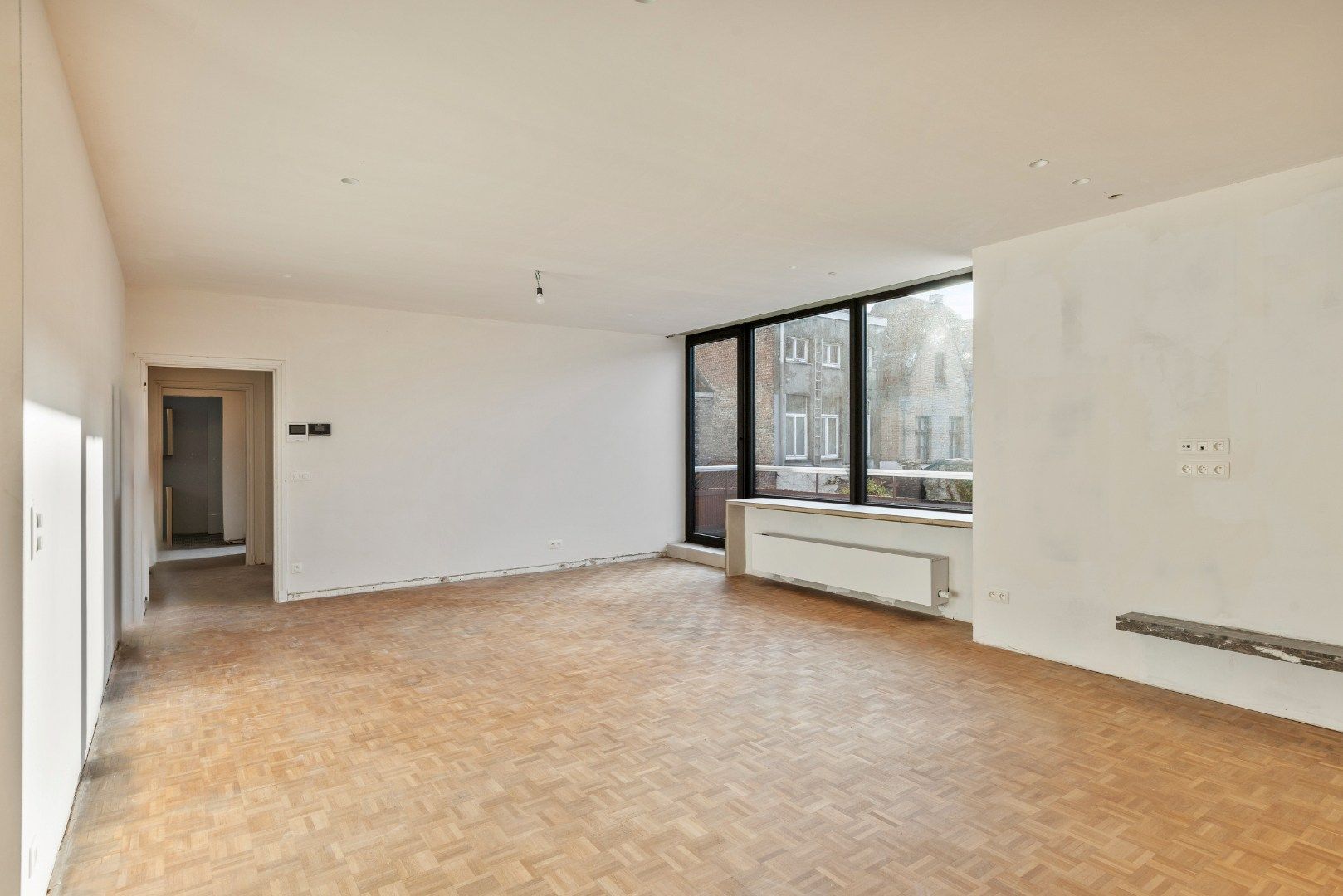 af te werken kangoeroewoning met binnentuin binnen de Brugse Reien foto 21