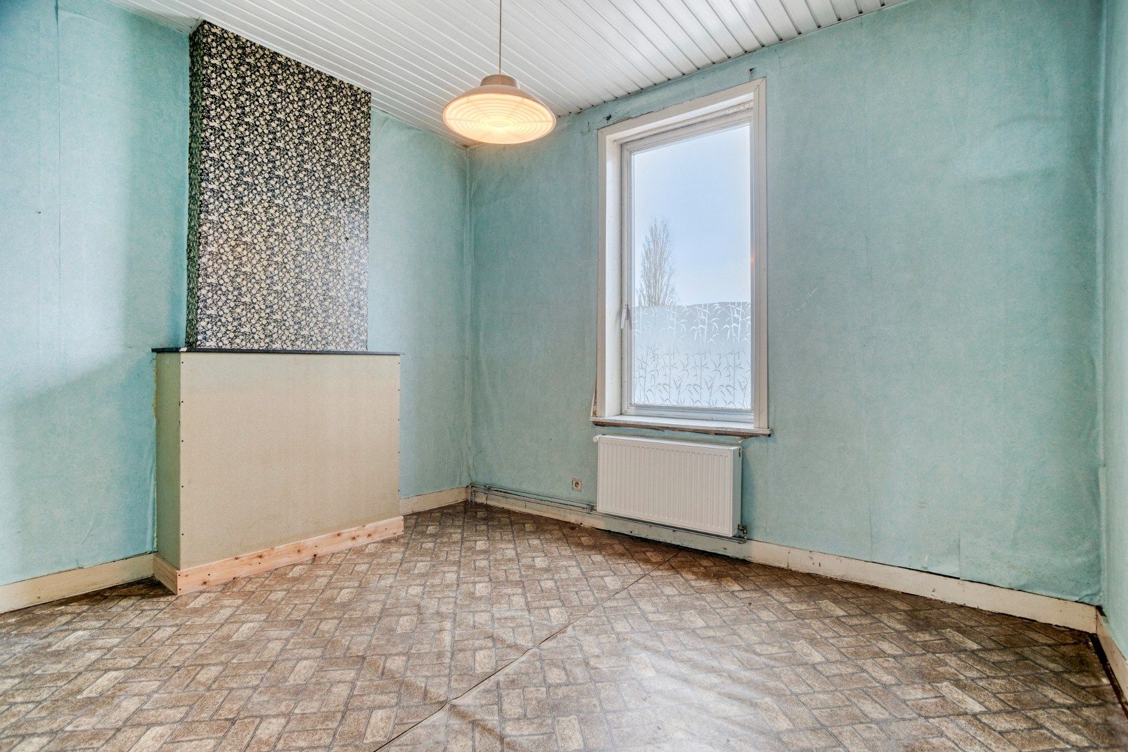 Goedgelegen rijwoning foto 7