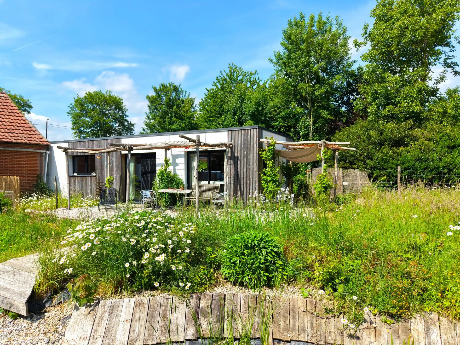 Tiny house met prachtige tuin en weids uitzicht op ca. 60a. foto 10