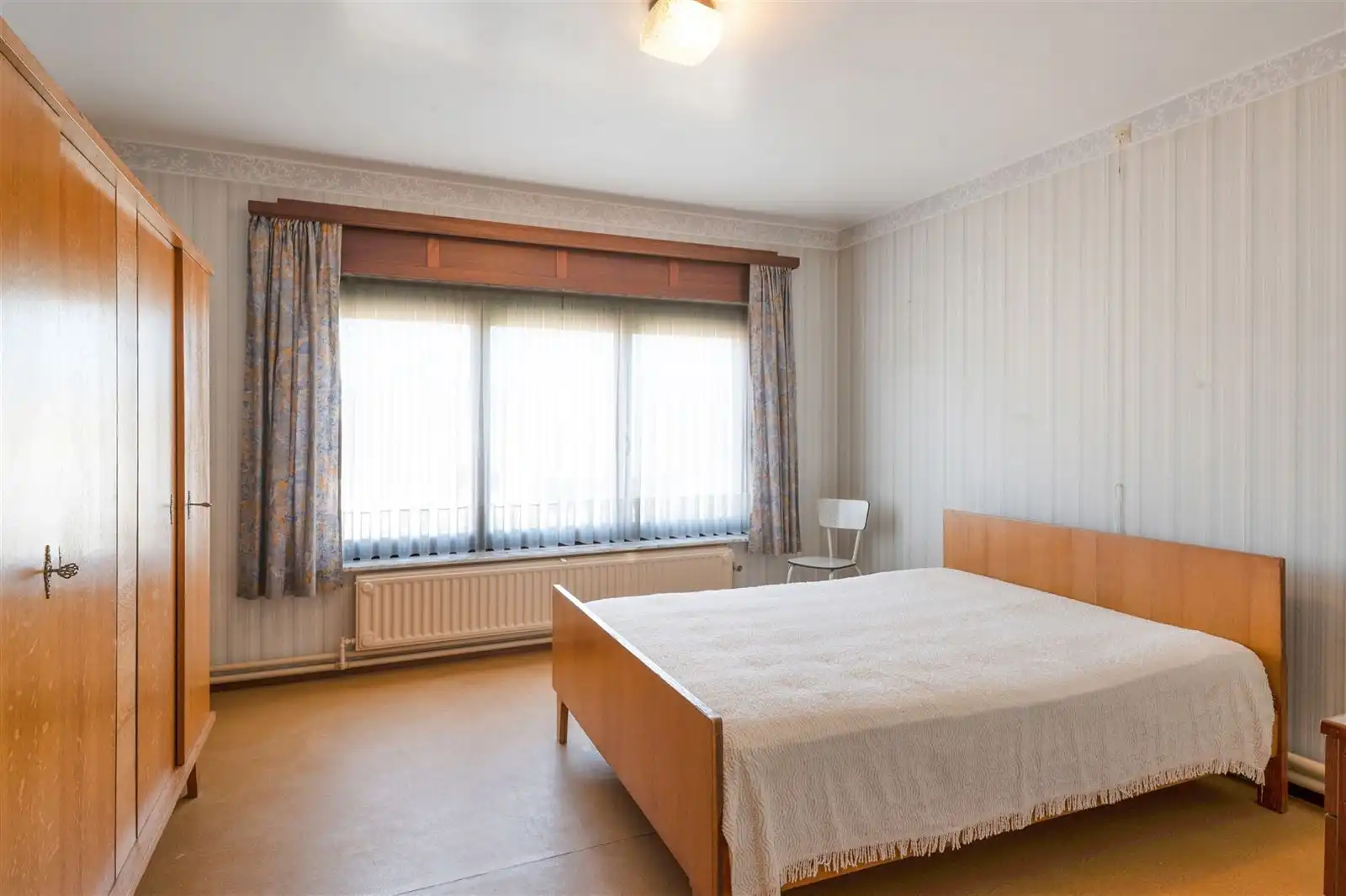 Op te frissen 4 gevelwoning met tuin op 10are92 met prachtig zicht over weilanden foto 16