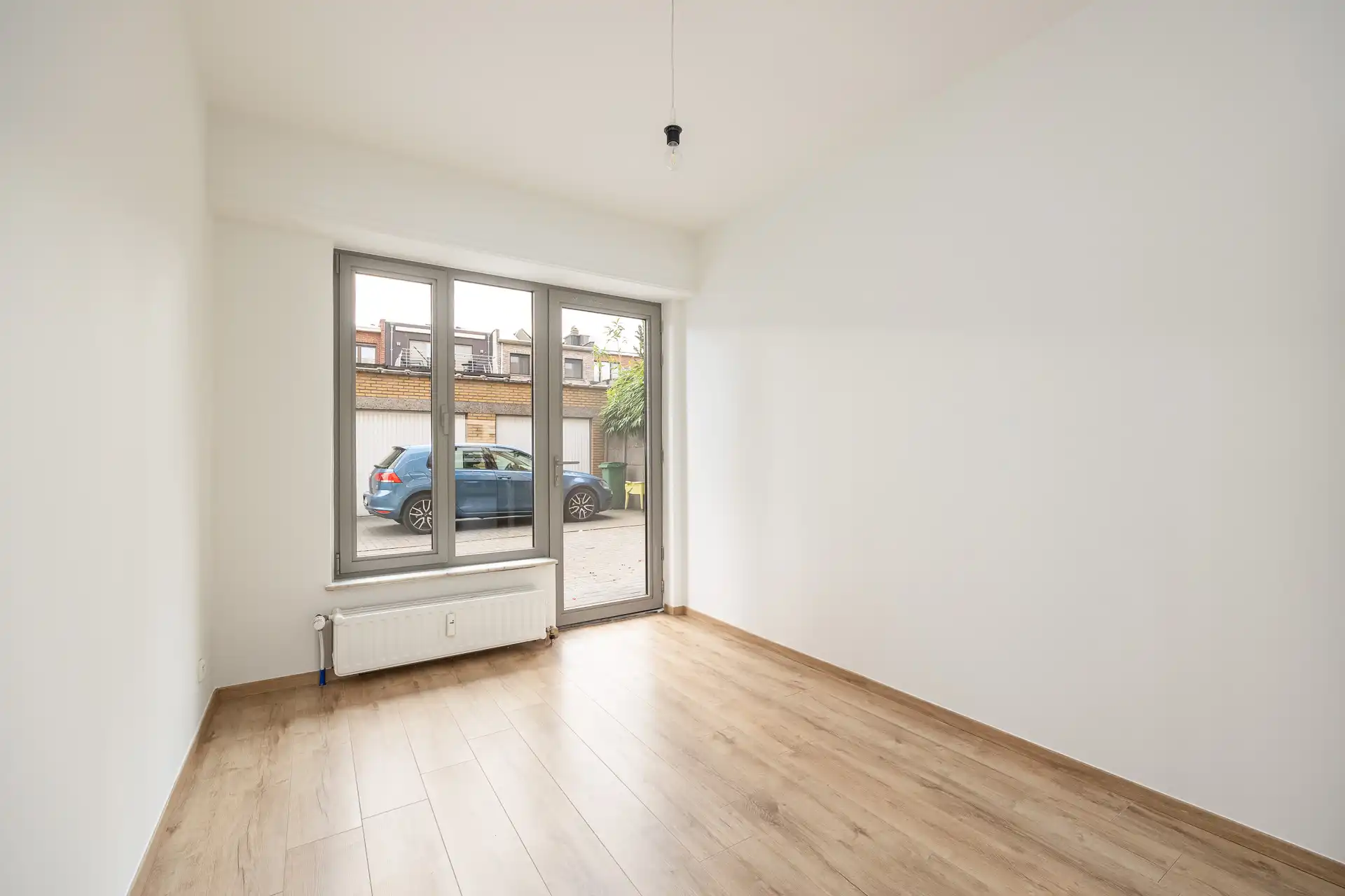 Instapklaars gelijkvloersapp met 2 slaapkamers + garagebox foto 10