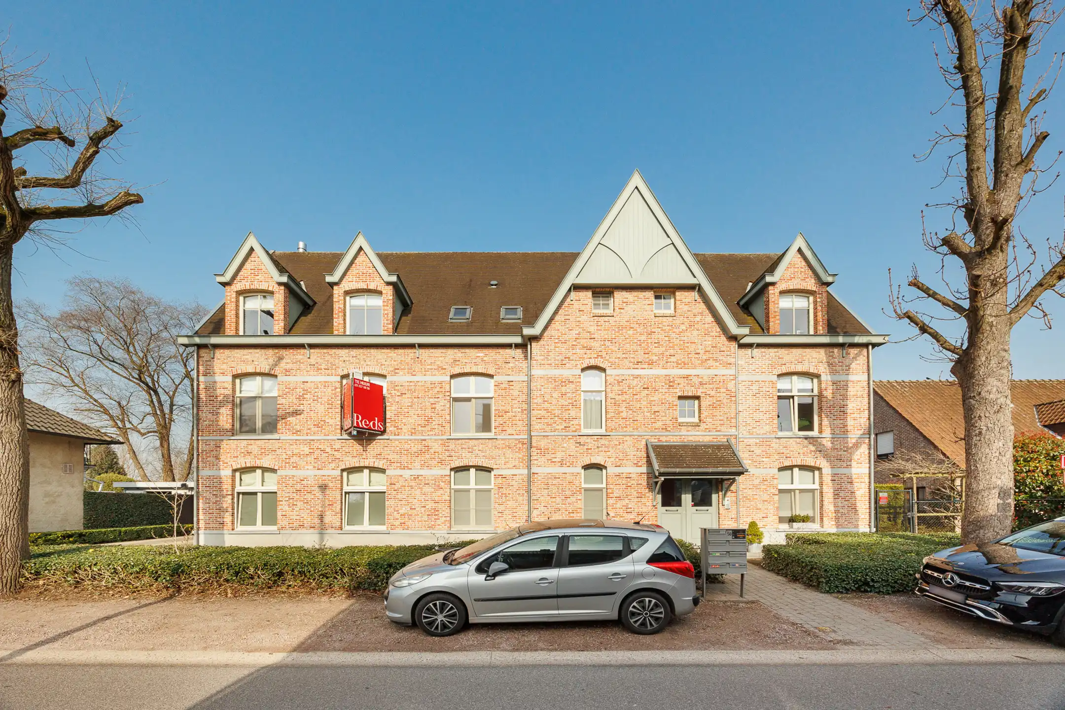 Gelijkvloers appartement met terras/tuintje te huur foto 2