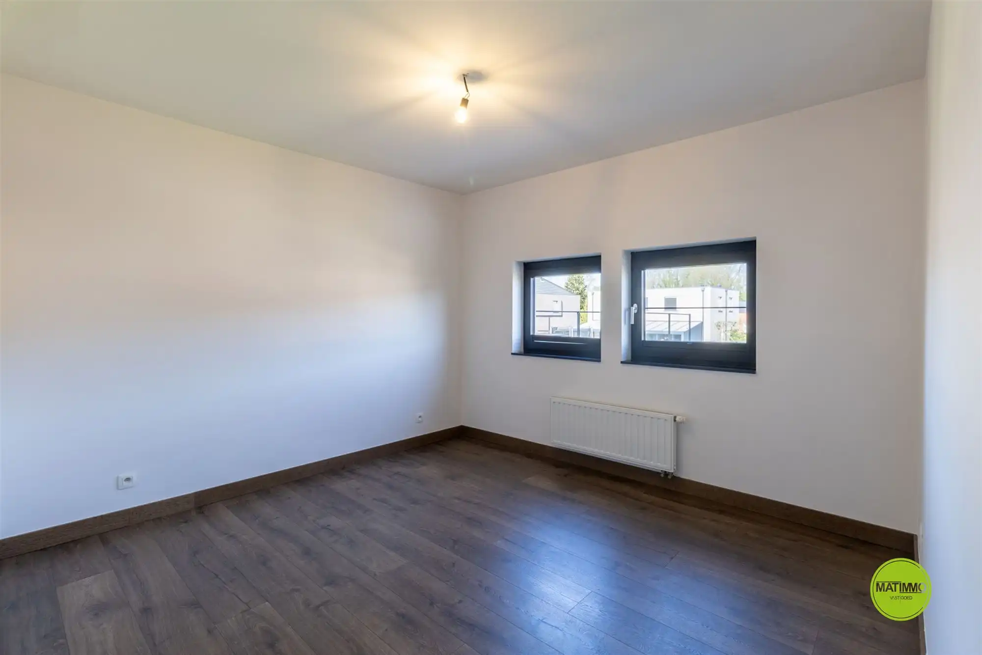 Moderne open bebouwing met 3 slaapkamers en tuin foto 12