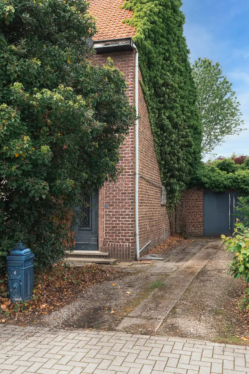 Gezellige, te renoveren open woning in een rustige straat foto 2