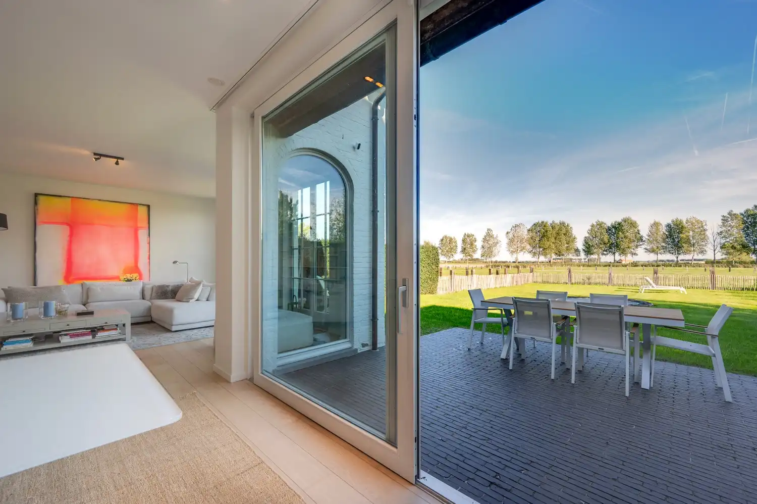 Rustig gelegen koppelvilla met prachtige tuin en open zicht over de weilanden foto 5