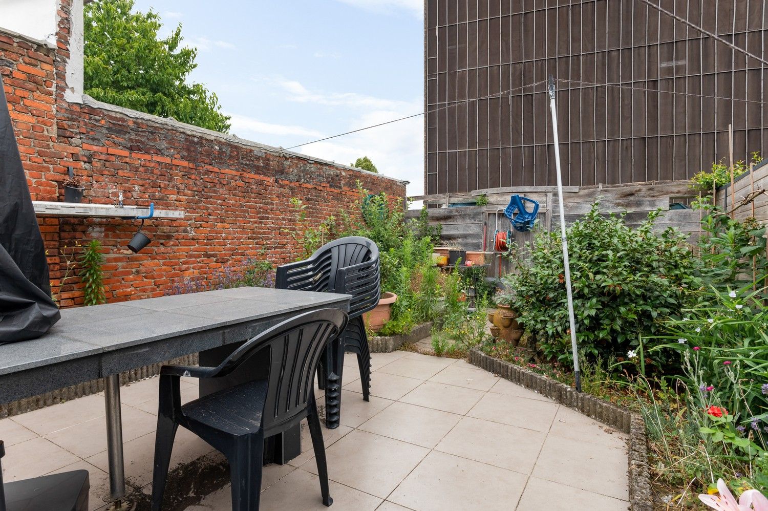 Huis met 2 slaapkamers en tuin te koop in Deurne! foto 9