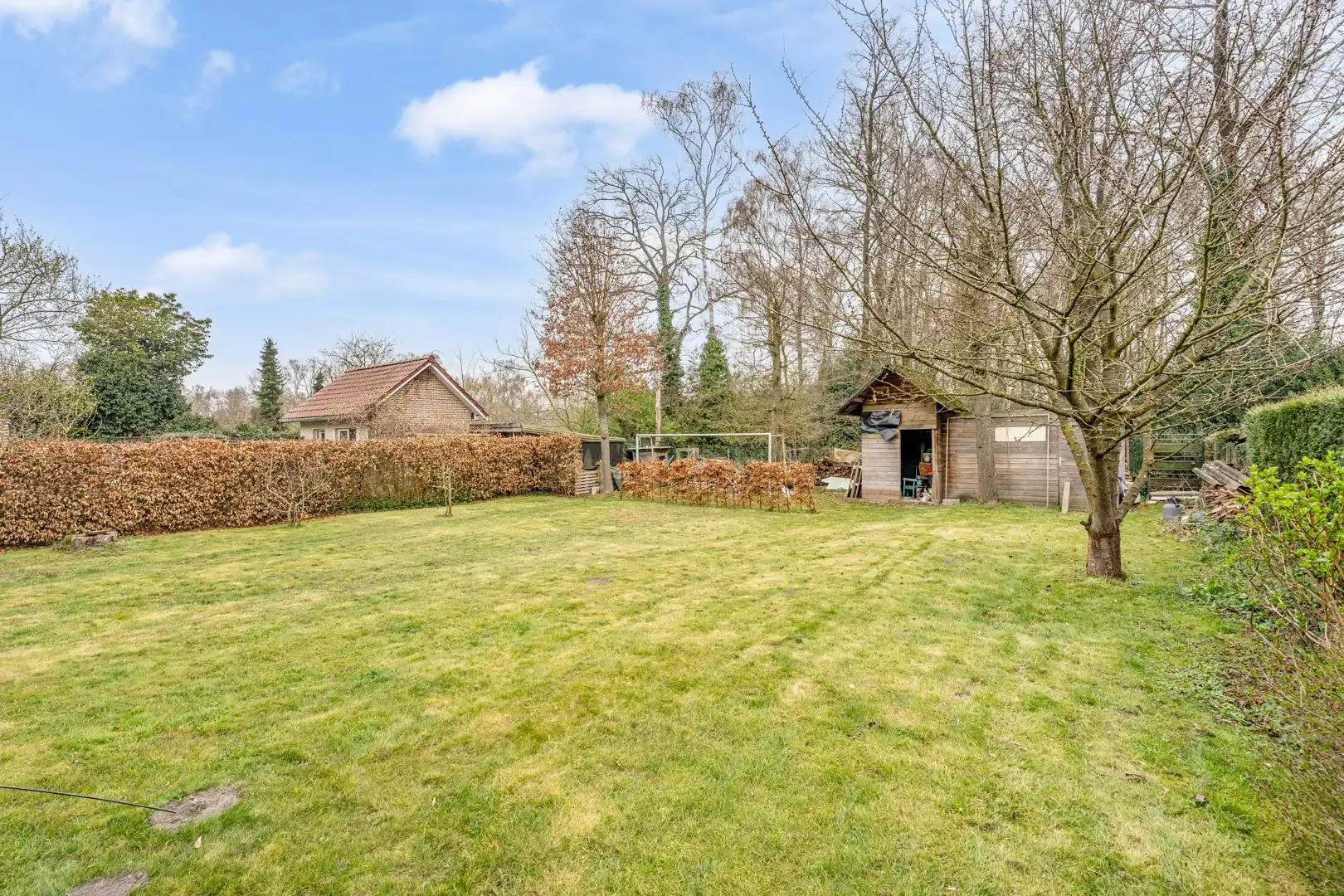 Charmante vrijstaande woning met ruime tuin in de Rozenstraat foto 13