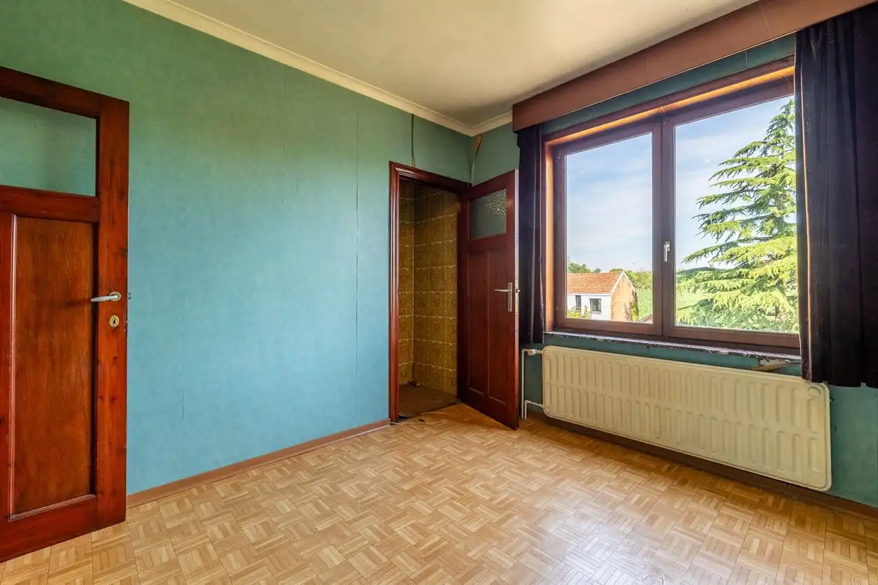 Charmante woning met tuin, 2 slk, garage en uniek zicht op groen landschap foto 21