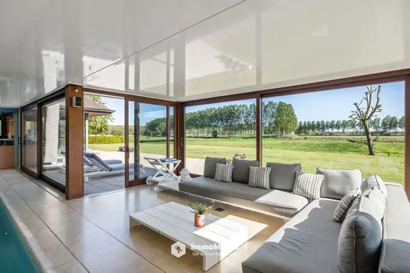 UNIEKE VILLA MET BINNENZWEMBAD EN PAARDENSTALLEN OP EEN TOPLOCATIE TE KOOP IN MENDONK (GENT) foto 22