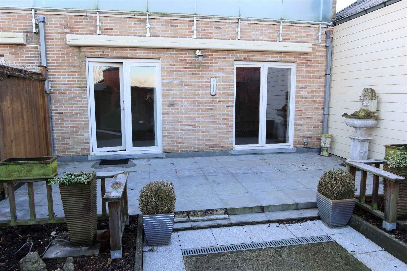 Gelijkvloers app met 2 slk, tuin en garage foto 18