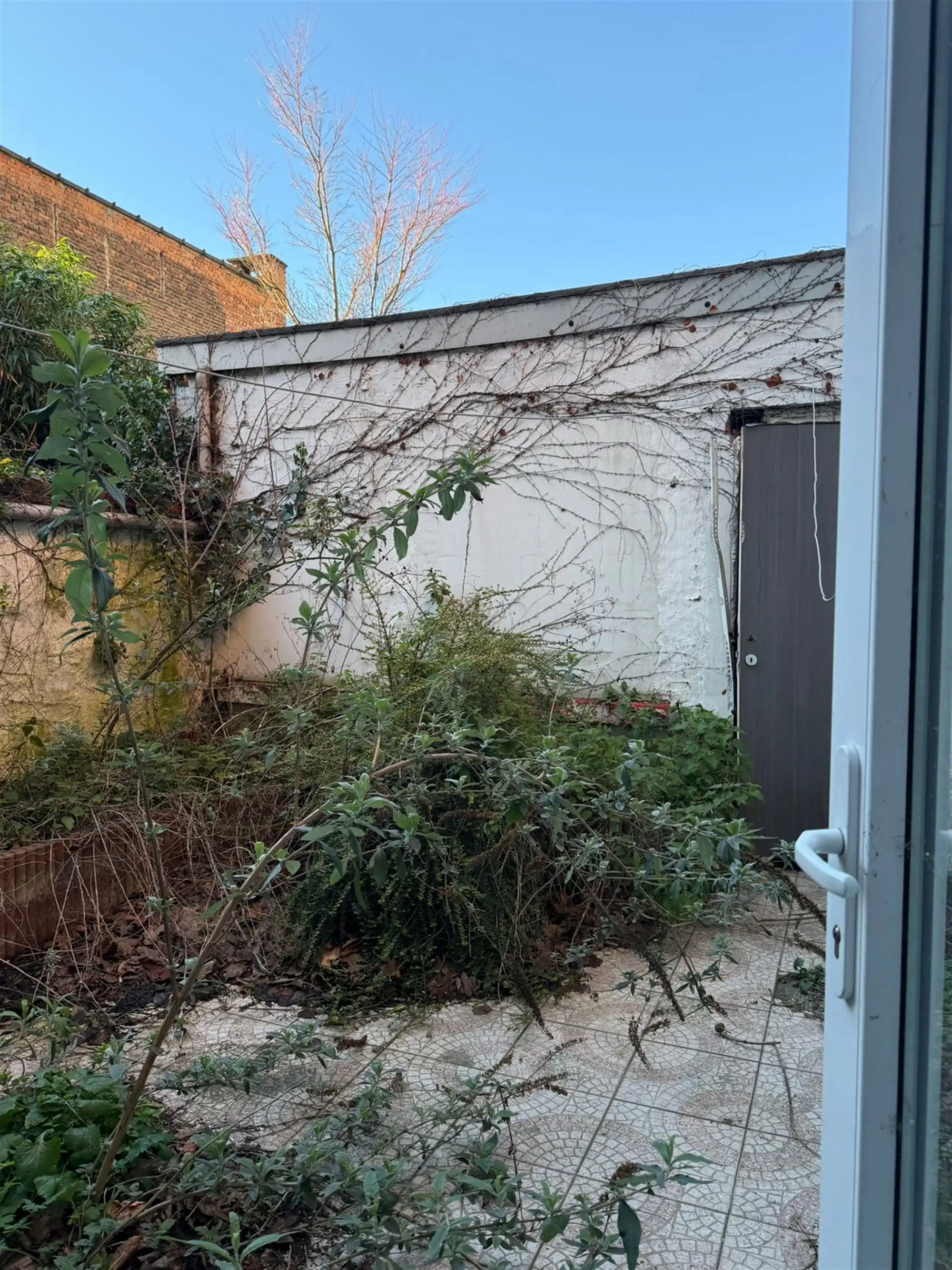 Geacht vergund opbrengsteigendom met stadstuin foto 6