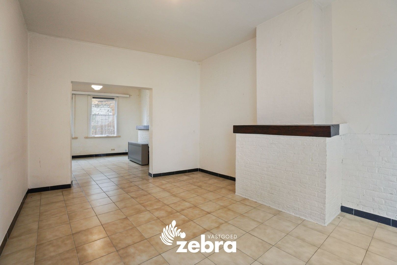 Deels gerenoveerde woning met twee slaapkamers te centrum Tielt! foto 6