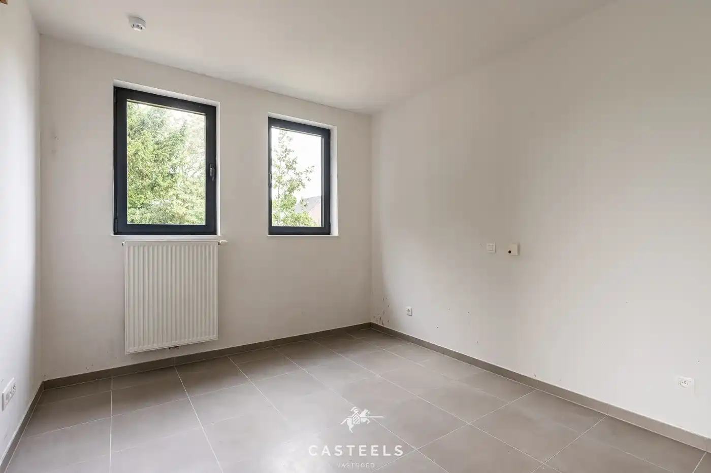 Lichtrijk nieuwbouw hoek appartement met terras te Kluisbergen foto 6
