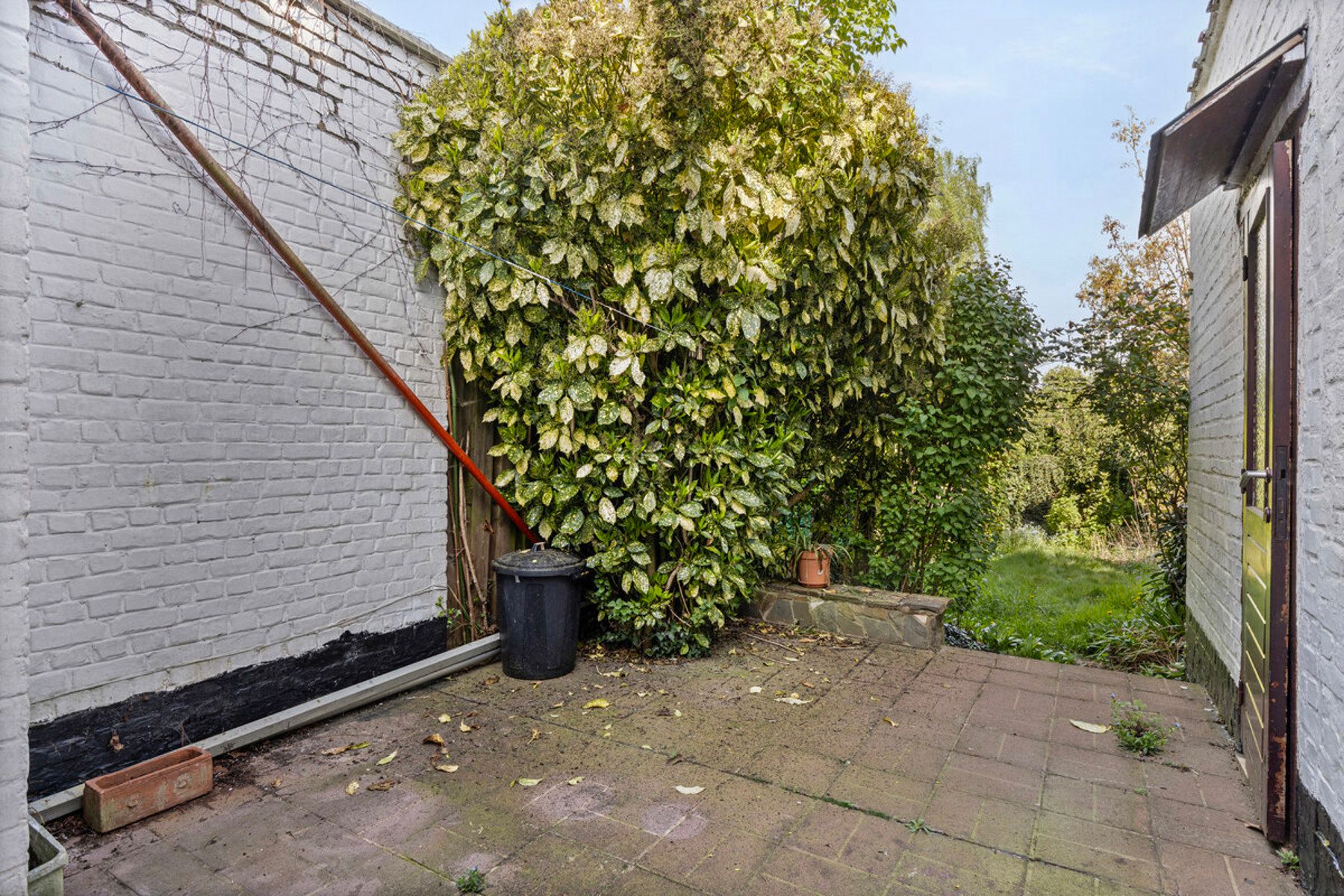 OPTIE Op te frissen eengezinswoning met 3 slaapkamers en tuin foto 16